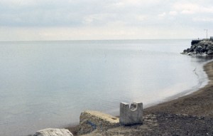 1996. Four 16 mm film loops were projected onto a salt curtain (42’ x 11’) at the South Bend Regional Museum of Art, South Bend, IN. This image: camera stand built into the concrete Chicago lakefront from which to film the lake at different times and temperatures.