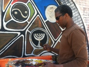 Williams restoring All of Mankind by Bill Walker (by Alison Cuddy/WBEZ)