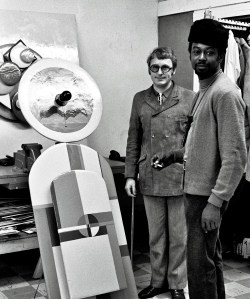 MCA director Jan van der Marck and Art & Soul director Jackie Hetherington with "Black Madonna and Child" by Reggie Madison