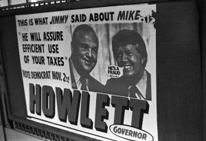 Truth Bubble stickers placed on political sign, ca. 1979